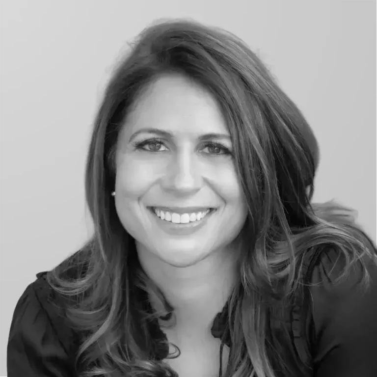 Dr. Ilana Grossman, NoMad dentist at Midtown Dental Group in Manhattan, smiling in a professional headshot