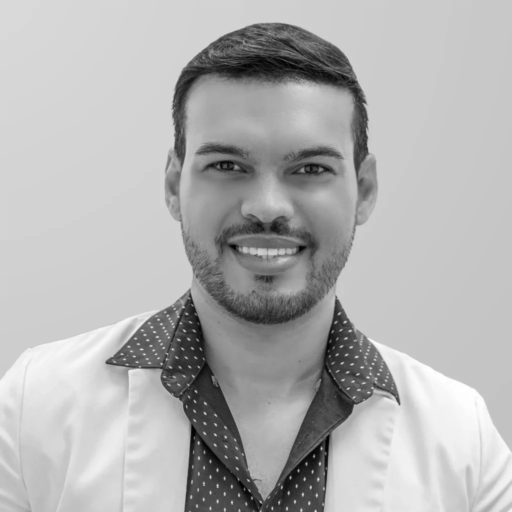 Dr. Giancarlo Brezillion, Jersey City dentist at Midtown Dental Group, smiling in a professional headshot