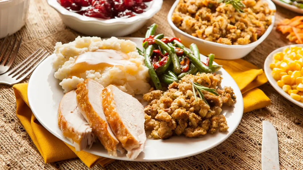 Dr. Daniell Mishaan, Midtown Dental Group founder, interacting with a patient