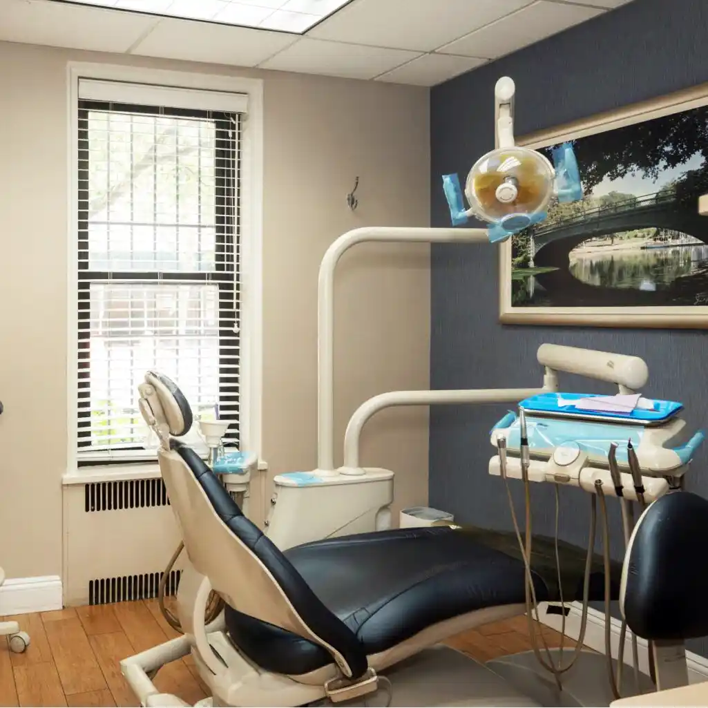 Modern dental treatment suite at Midtown Dental Group Prospect Heights, featuring a clean, comfortable patient chair and advanced dental technology in a bright Brooklyn office