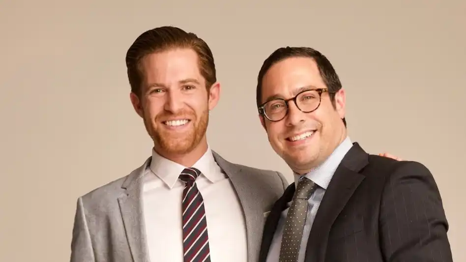 Professional portrait of Dr. Daniell Mishaan and Dr. Michael Bruno, founders of Midtown Dental Group