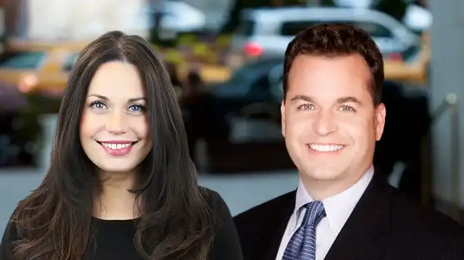 Group headshot of Dr. Michael Lorman and Dr. Erica Simonovsky at Midtown Dental Group Grand Central in Manhattan
